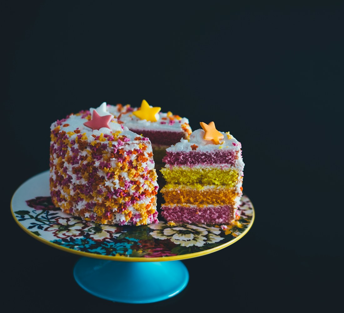 Birthday cake with lit candles